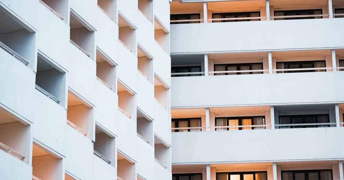 Elegant hotel facade showcasing modern architecture in Bali, Indonesia at dusk.