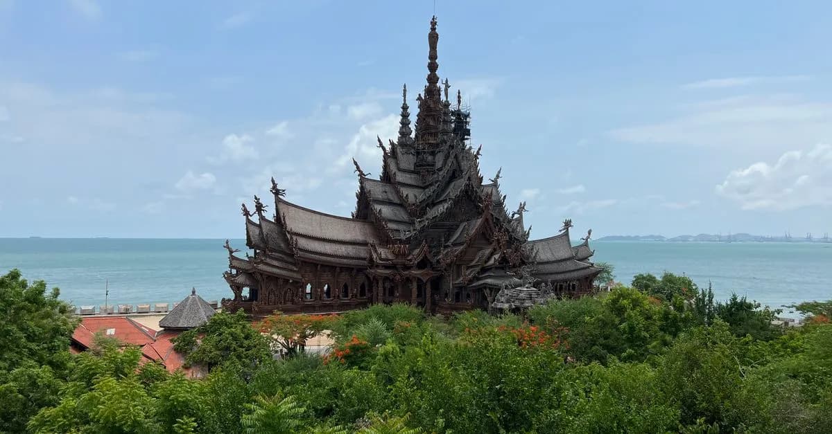 The Sanctuary of Truth's wooden architecture set against a serene ocean backdrop.